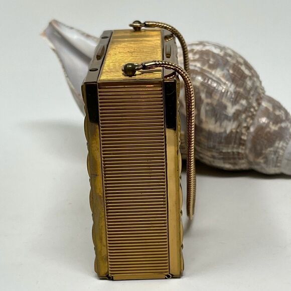 Vintage, gold tone compact/purse.  